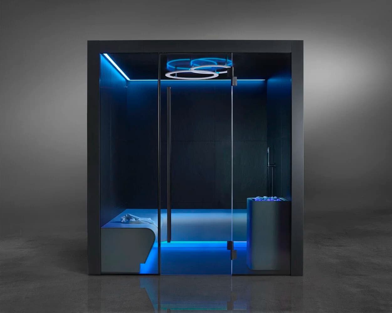Infinity steam room with bronze glass and perimeter lighting