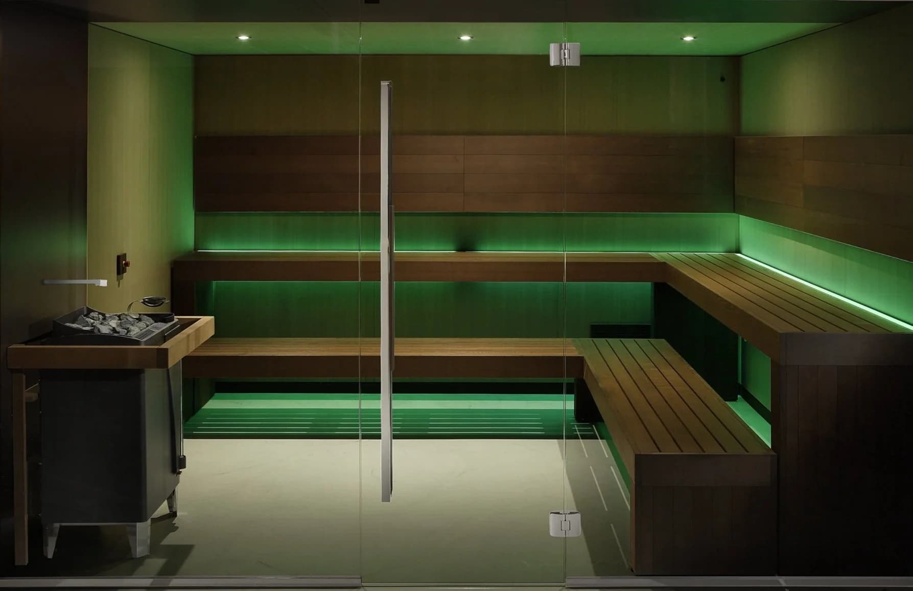 Indoor sauna with timber cladding and ergonomic benching
