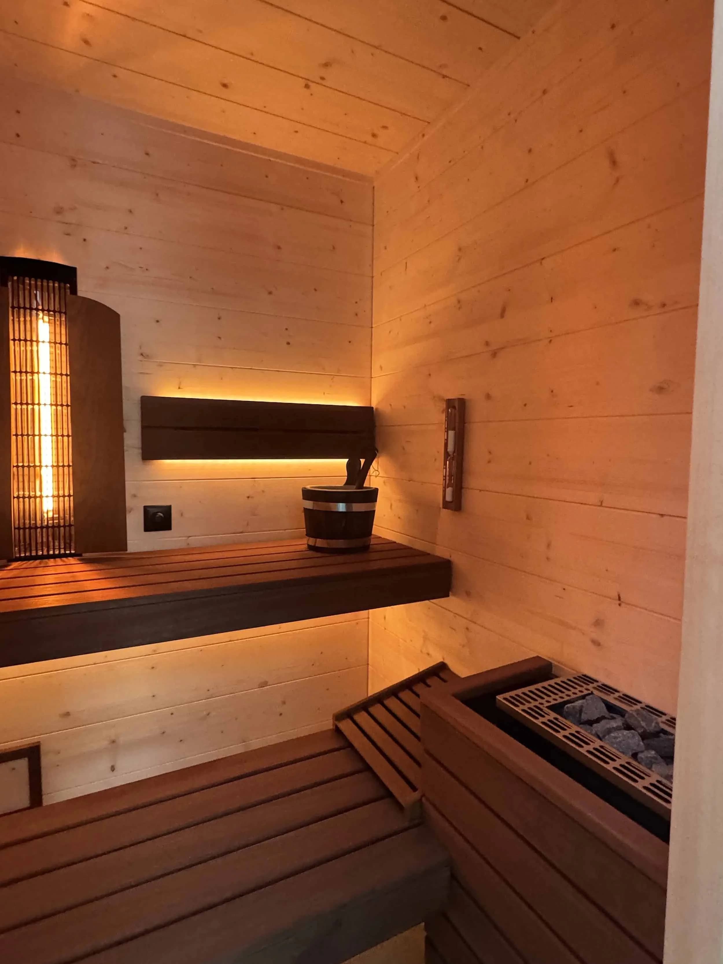 Sauna and cold water installed together as a contrast therapy suite